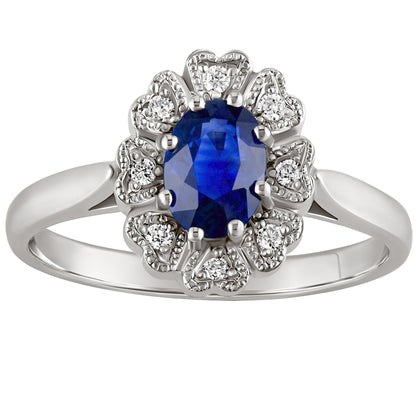 vintage style cluster ring with blue sapphire in platinum. made in hatton garden