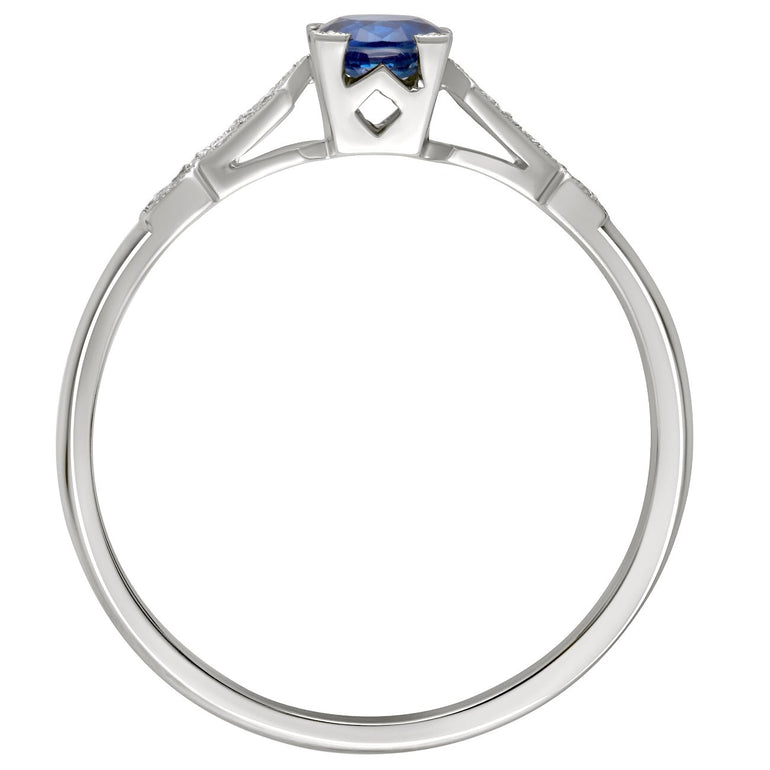 Round blue sapphire in a square setting with diamond shoulders in platinum. Made in London