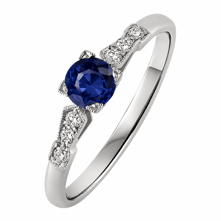 Vintage style Blue sapphire centre ring with geometric square setting and diamond. Made in London