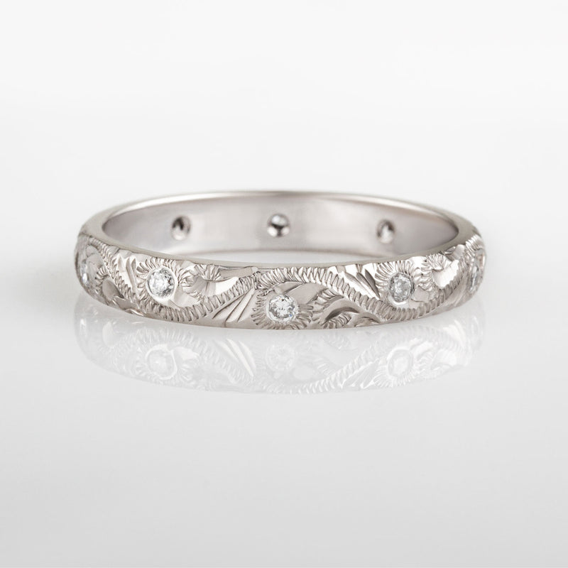 Diamond paisley engraved wedding ring in white gold