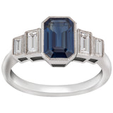 Emerald cut sapphire and diamond engagement ring
