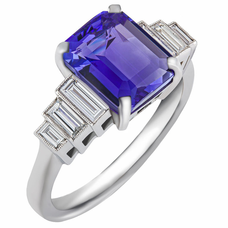 Emerald cut tanzanite ring with baguette diamonds