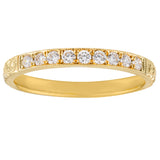 Engraved yellow gold wedding band with diamonds