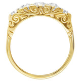 5 diamonds engagement ring rings with scroll pattern and diamond points in 18ct yellow gold. Made in the UK.