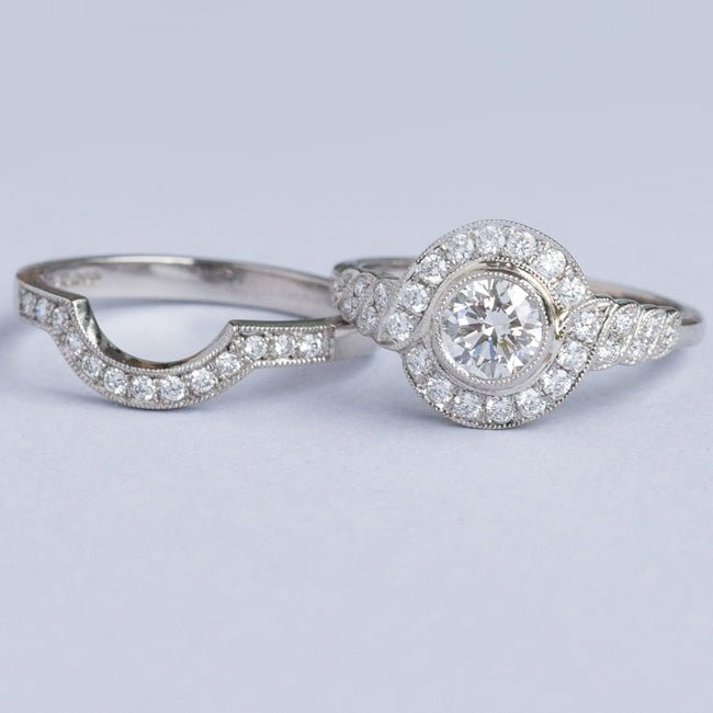 Matching set with shaped diamond wedding ring and cluster engagement ring in platinum
