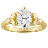 Oval lab-grown diamond engagement ring in 18ct yellow gold and diamond leaf side. Made in London