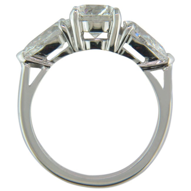 Lab grown diamond three stone engagement ring with round and pear diamonds