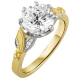 two-tone 18ct yellow gold and platinum engagement ring features lab-grown diamonds set on platinum leaves. Made in the UK