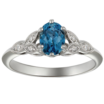Oval aquamarine engagement ring in platinum
