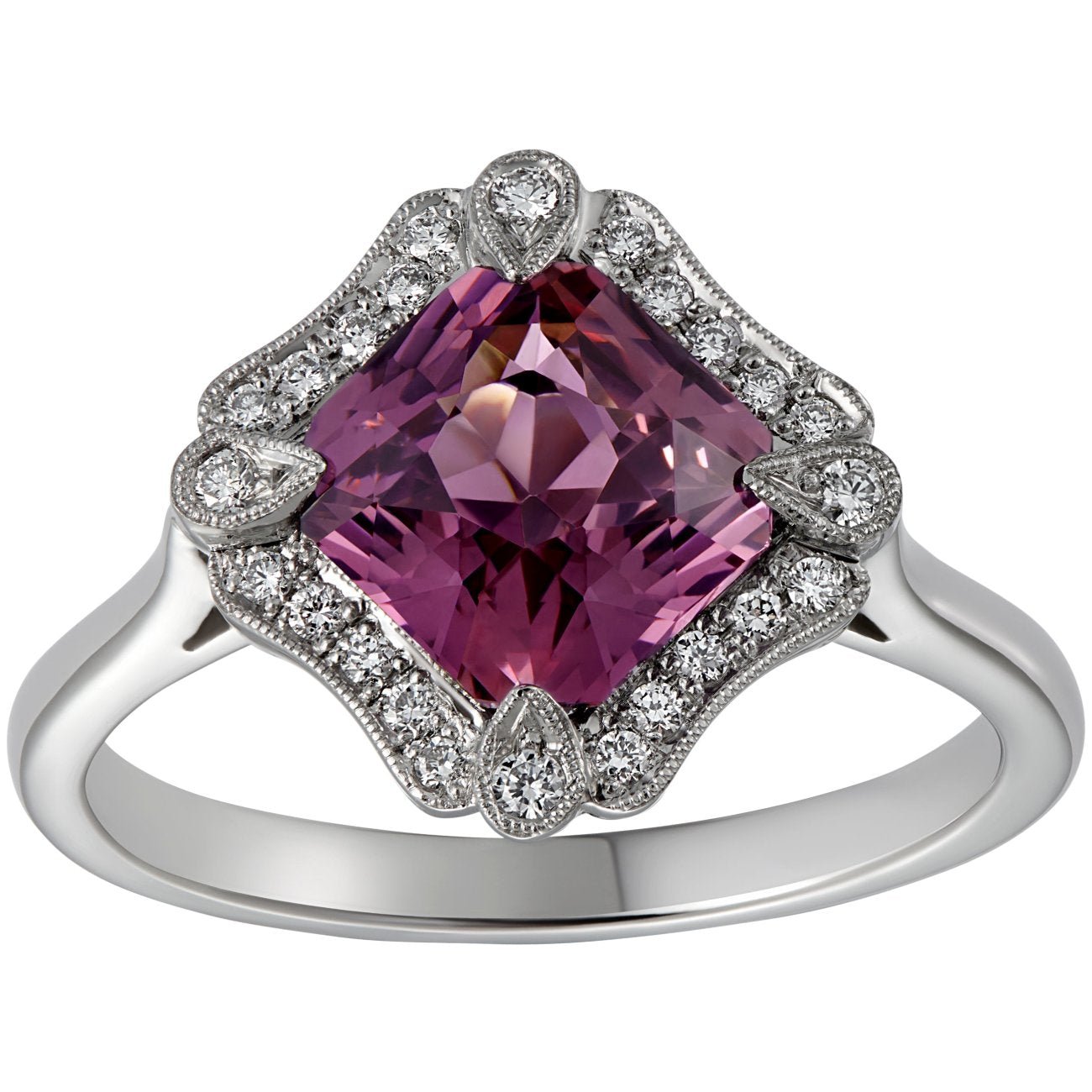Pink sapphire halo ring with diamonds in platinum