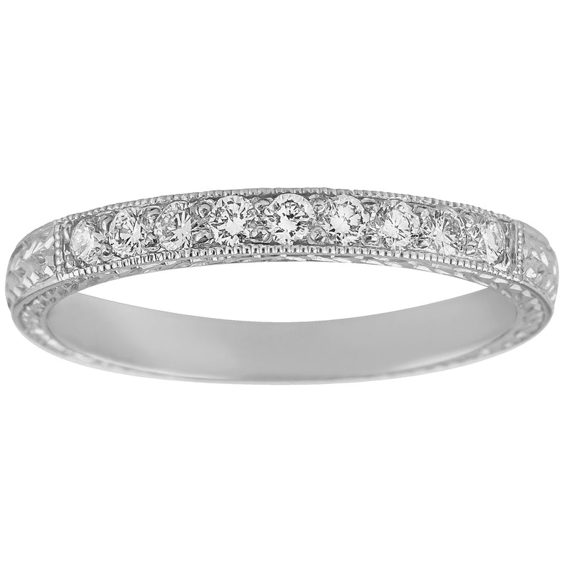 Platinum diamond eternity ring with hand engraved laurel design