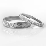 His and hers paisley pattern engraved platinum wedding band set