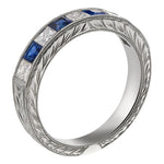 Sapphire and diamond wedding band with engraved laurel pattern in platinum