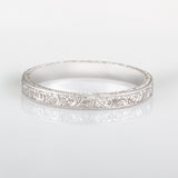 Scroll pattern engraved wedding ring in white gold