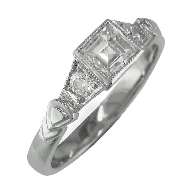 Square step cut engagement ring