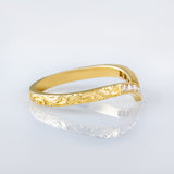 V-shape diamond wedding ring in gold hand engraved