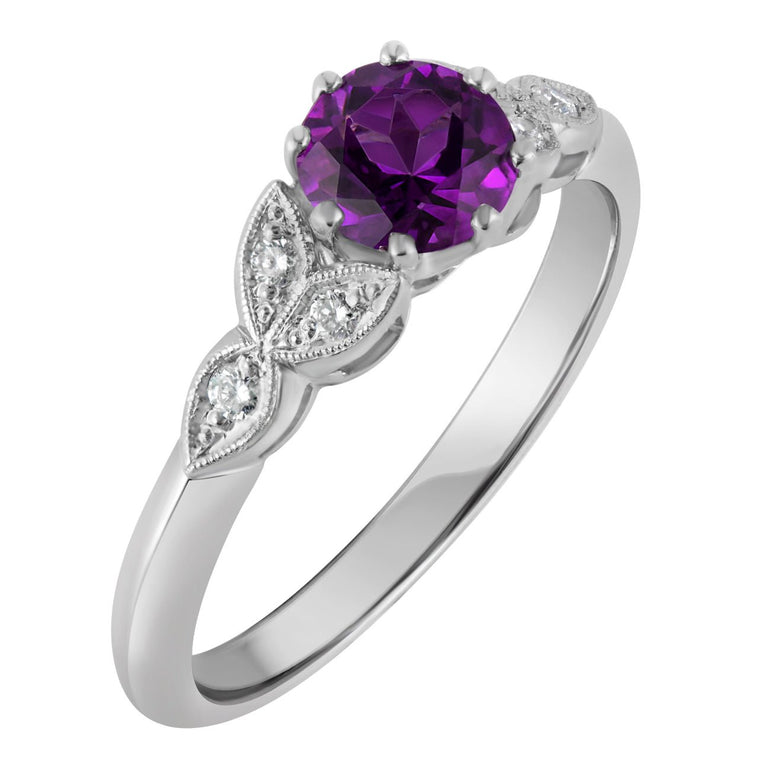 Vintage amethyst engagement ring with diamonds in platinum