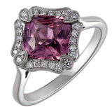 Vintage pink sapphire cluster ring with diamond halo