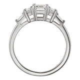 Vintage style emerald cut diamond ring in platinum with trapezoid baguette diamonds
