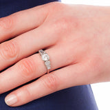 Vintage style lab grown diamond engagement ring with stepped lab grown baguettes