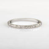 White gold paisley engraved wedding band