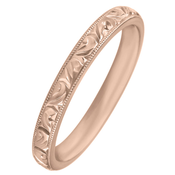 Women's rose gold wedding ring with engraved scroll pattern