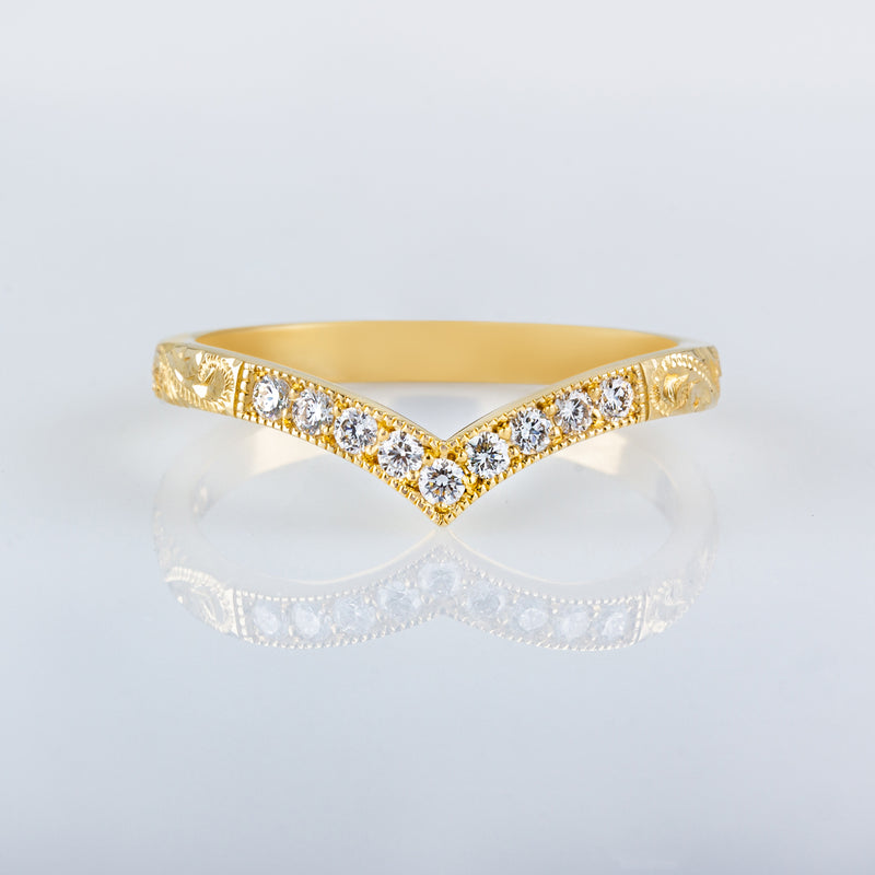 Diamond wishbone wedding ring in gold with engraved paisley pattern