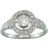 Edwardian diamond cluster ring with unusual spiral shoulders.