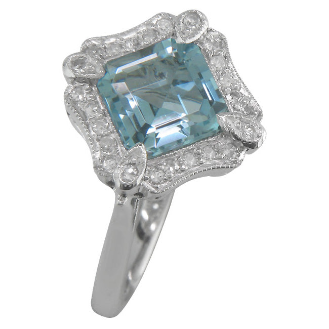 Aquamarine engagement ring with surrounding diamonds