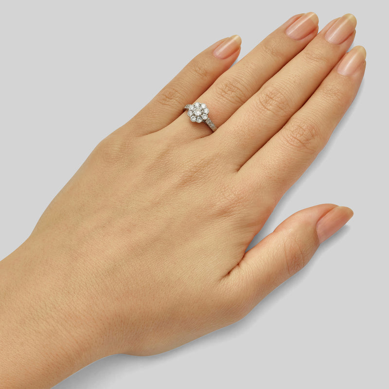 Edwardian diamond daisy cluster ring in platinum