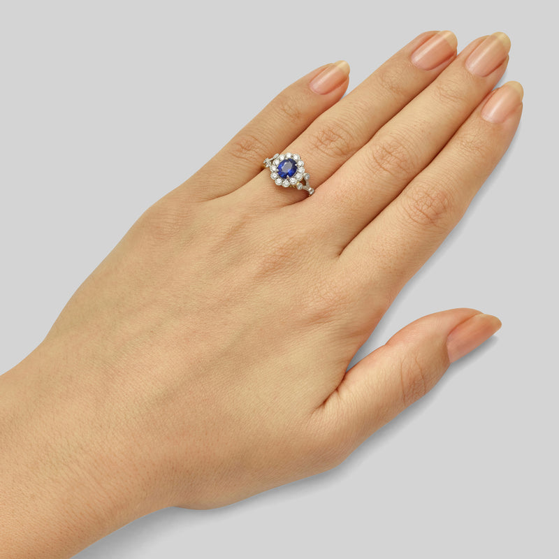 Belle Époque style oval sapphire ring with diamonds