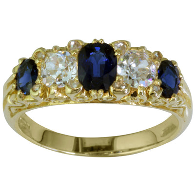 Victorian style sapphire and diamond carved half hoop ring