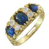 Seven stone sapphire and diamond ring
