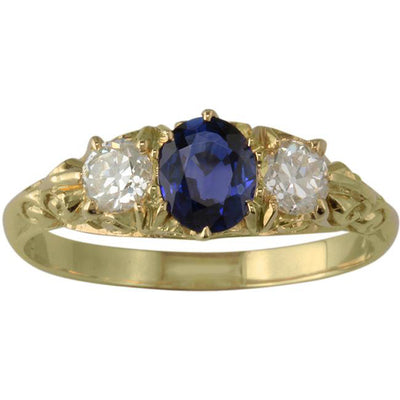 Sapphire and diamond engagement ring in Victorian antique style.