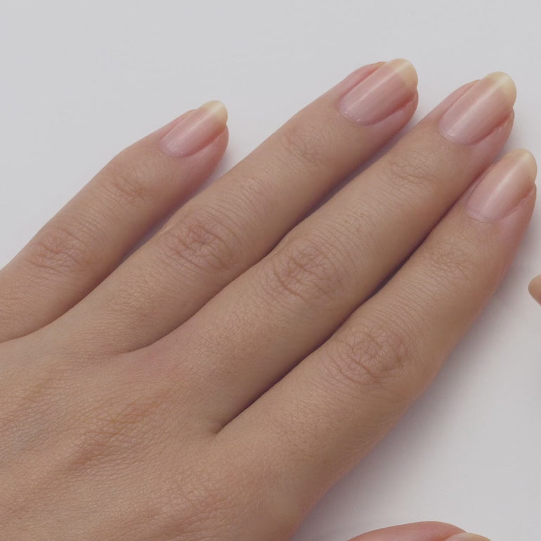 Oval ruby and diamond cluster ring in platinum and yellow gold