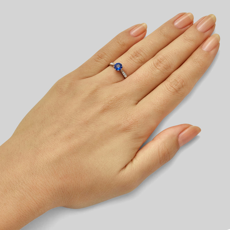 Platinum sapphire engagement ring with diamonds
