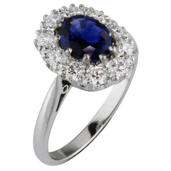 Oval sapphire diamond cluster ring