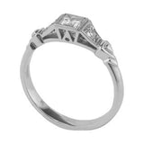 Triangular Art Deco motif for unique diamond ring from London jewellers.