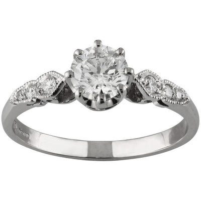 Edwardian style diamond ring with diamond set shoulders
