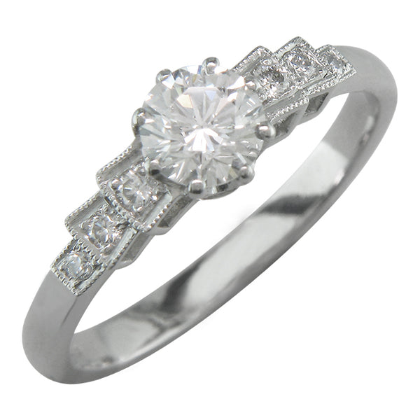 Platinum Art Deco diamond ring with diamond band.