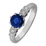 Vintage style sapphire and diamond engagement ring