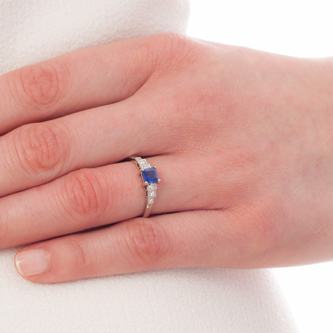 Sapphire ring in platinum on hand