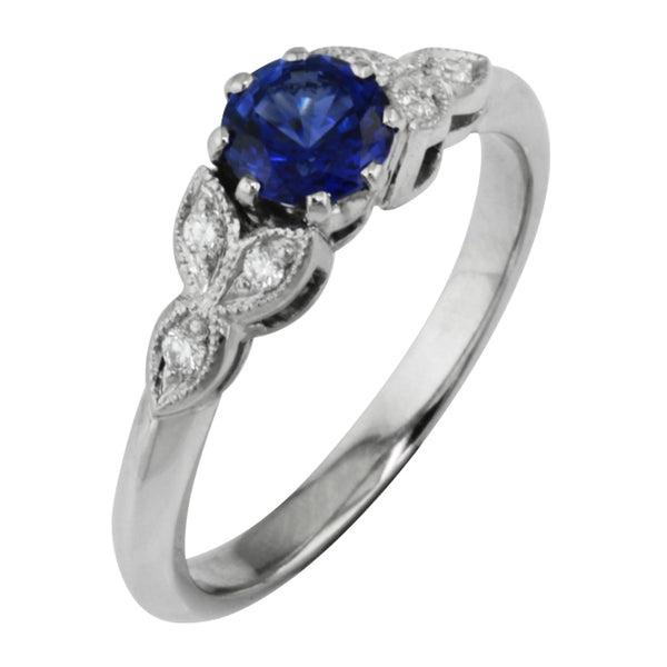 Flower sapphire engagement ring in platinum