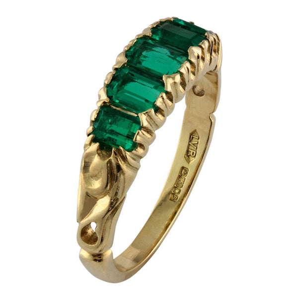 Five stone emerald ring in 18ct yellow gold