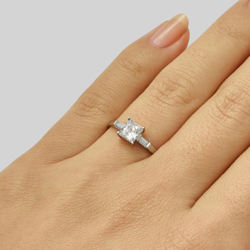 Princess cut diamond engagement ring with baguettes in platinum