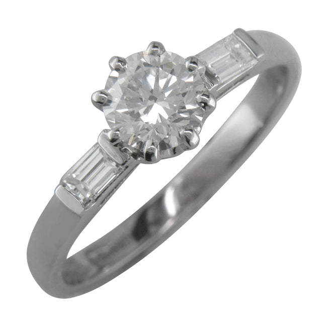 Platinum engagement ring with baguettes