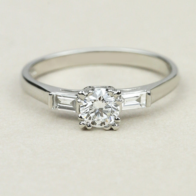 1930s round diamond ring with baguette shoulders