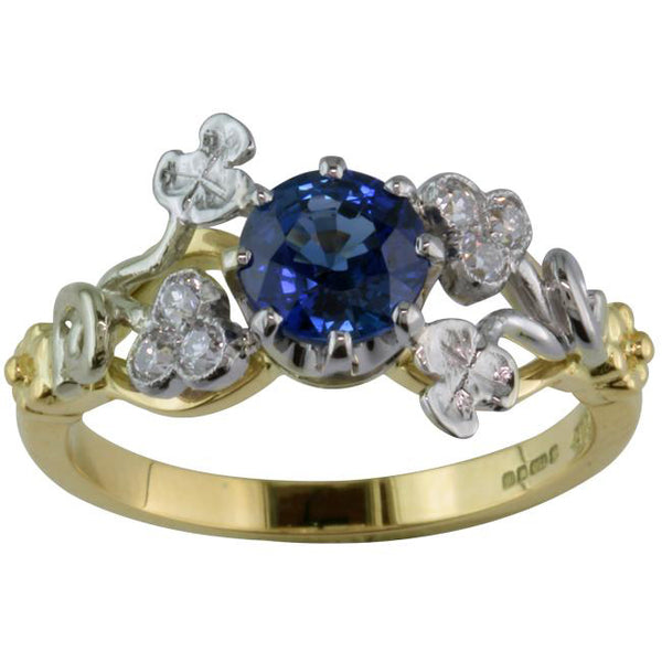 Sapphire diamond engagement ring in unusual vintage design.