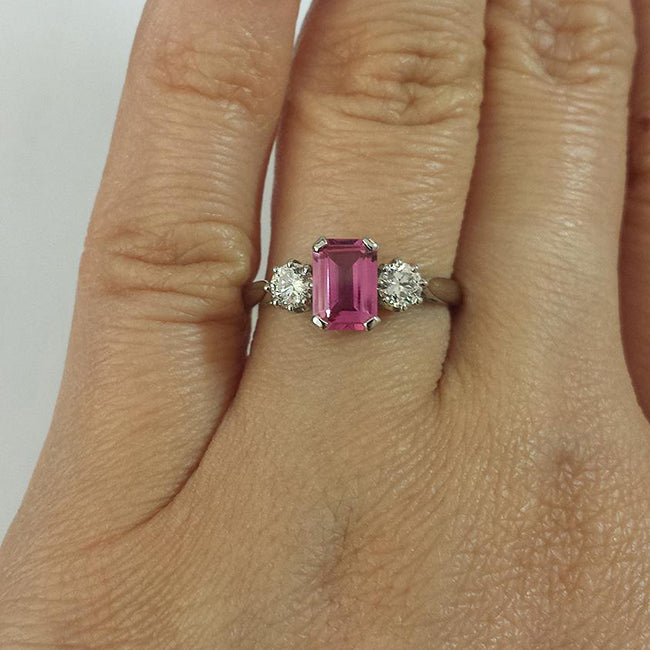 Pink sapphire and diamond trilogy ring