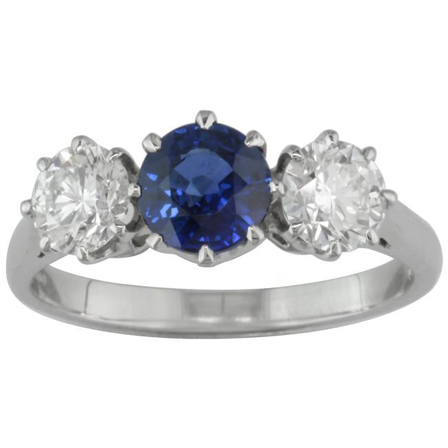 Classic three stone sapphire and diamond engagement ring